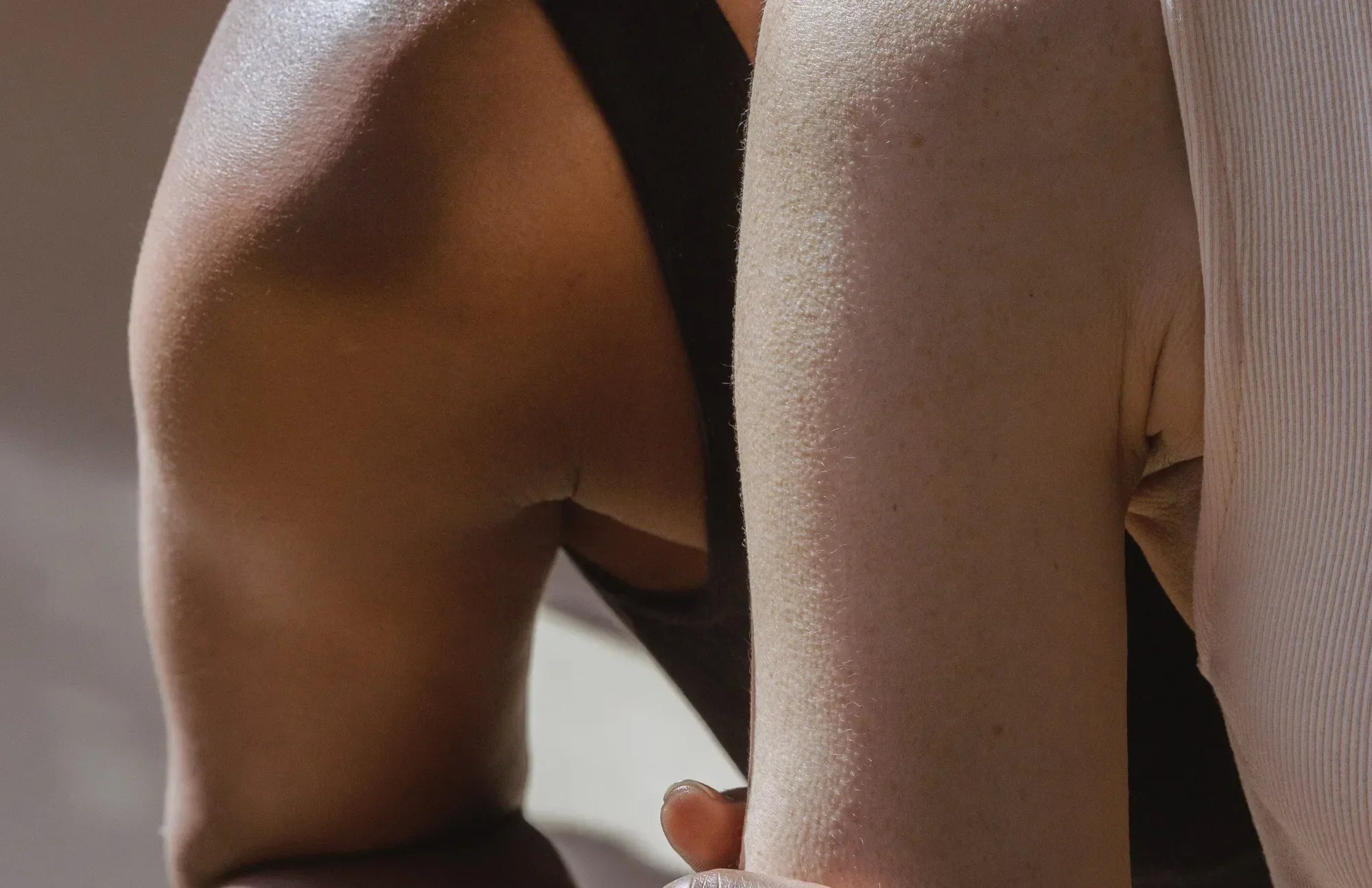 Two people sitting close together, symbolizing balance and synergy of prebiotics and probiotics working in harmony