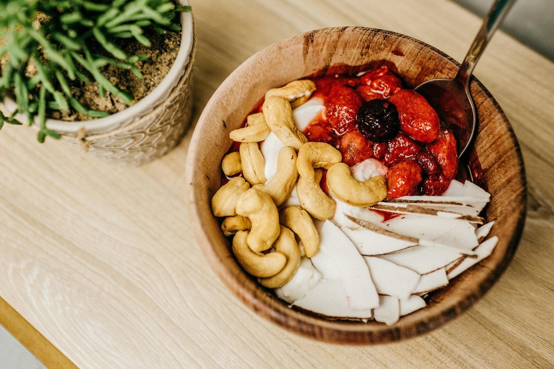 healthy vegan probiotic foods including cashews strawberries and raspberries