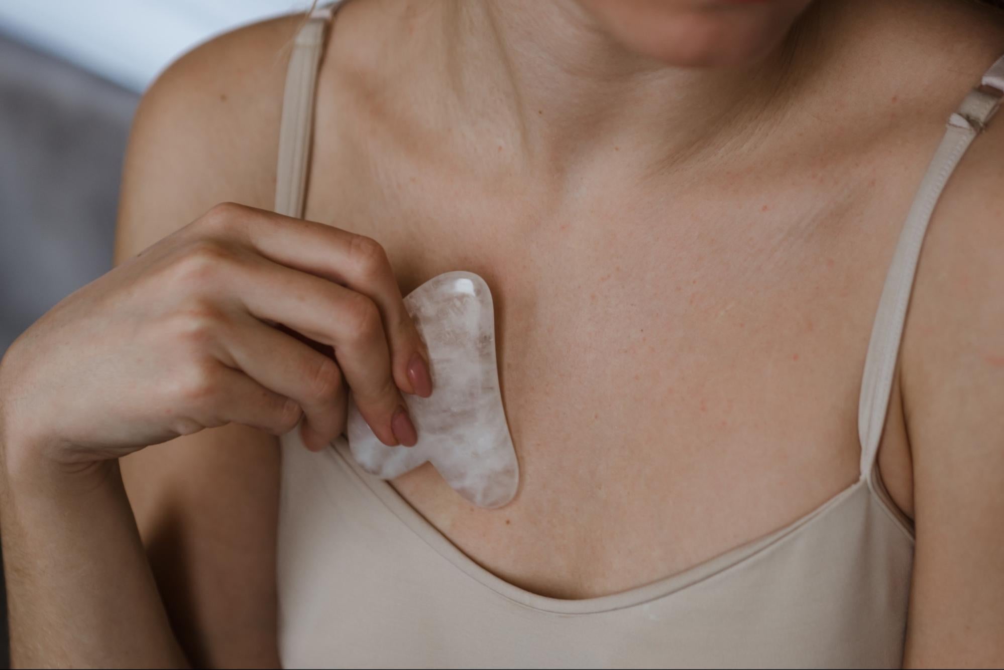 woman with ice pack on chest